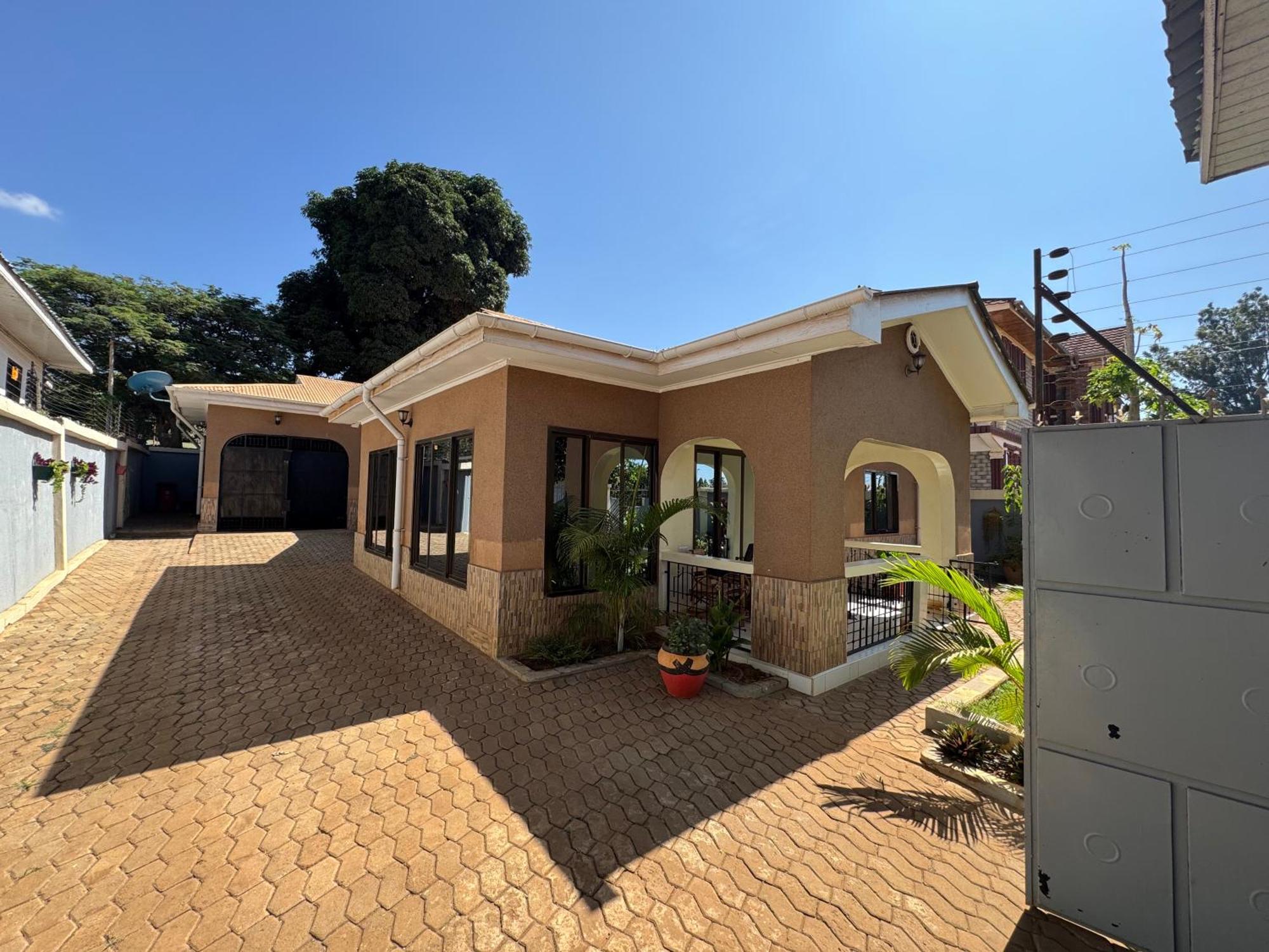 Apartamento Town Retreat Moshi Exterior foto